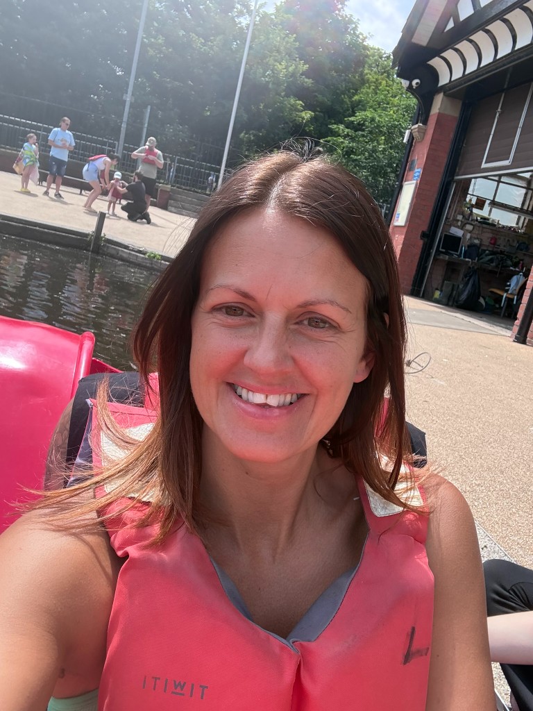 Sarah Grant outdoors in a life jacket