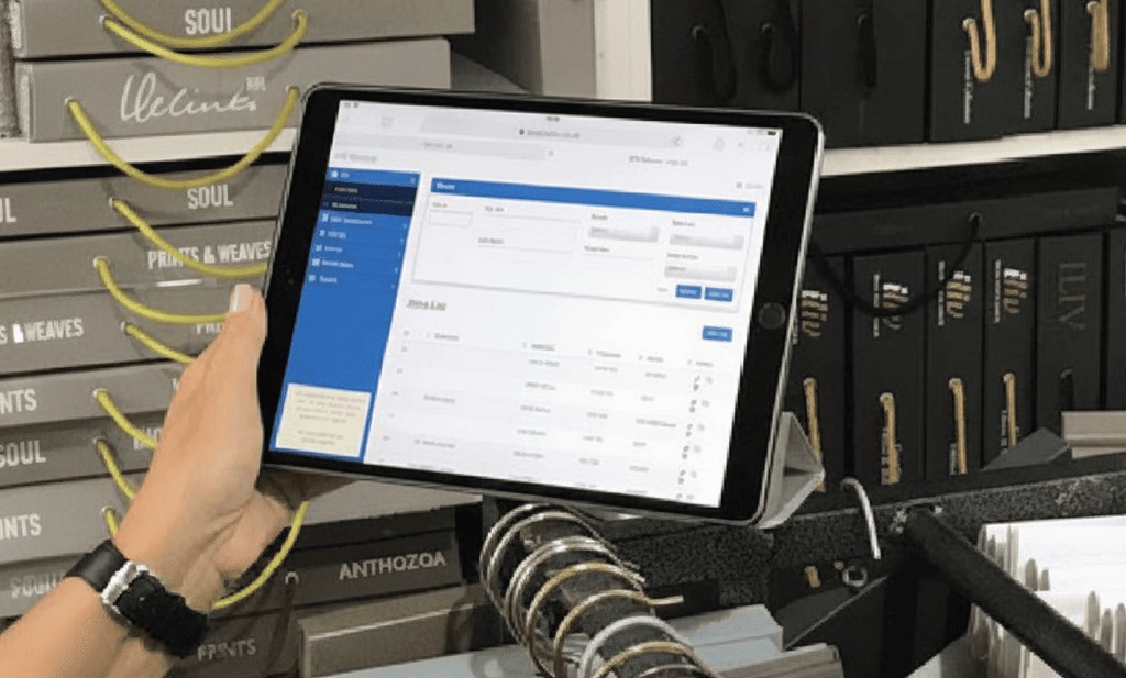 Using ACE Online on a tablet in a soft furnishings showroom